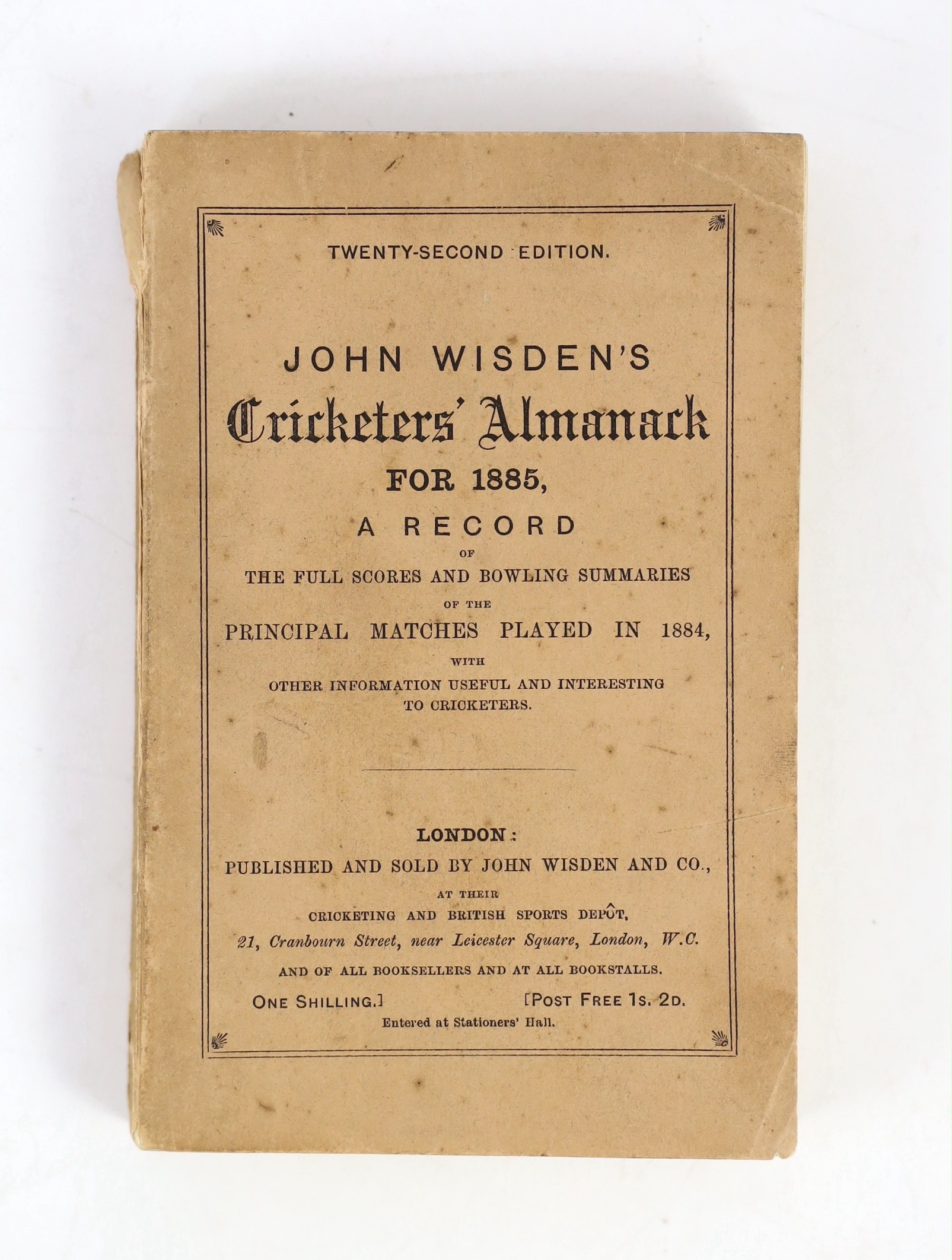 Wisden, John - Cricketers’ Almanack for 1885, 22nd edition, original paper wrappers, 2cm. tear to upper spine, but paper present, spotting to early advertisements, title, page edges and endpapers.